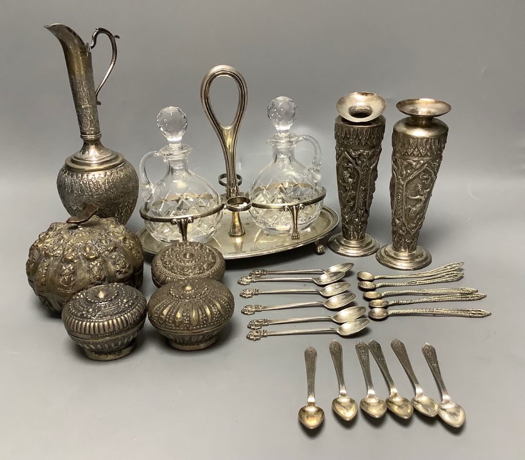 A pair of Thai Sterling silver specimen vases, a white metal ewer, a 'betel nut' box and cover, a set of silver teaspoons with elephant finials and sundries